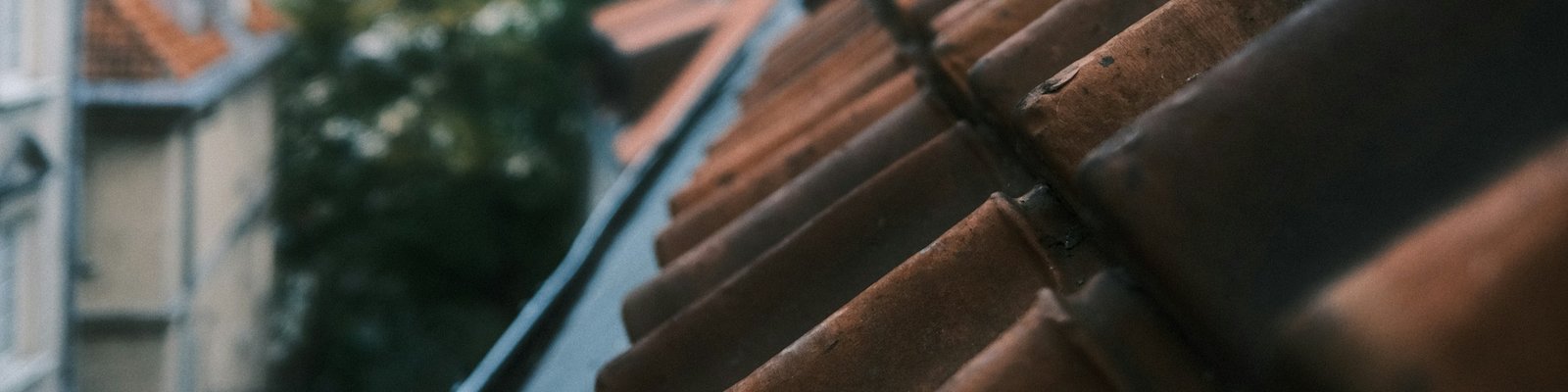 Rainy roof and gutters in a heritage block